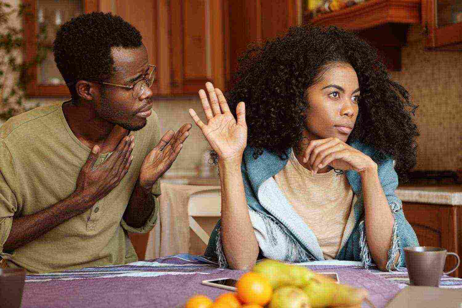 please forgive me unhappy african american male cheater holding hand his chest apologizing beautiful indifferent woman who ignoring refusing all his excuses telling him get lost