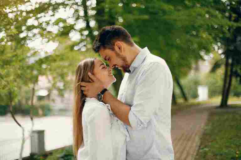 beautiful couple spend time summer park