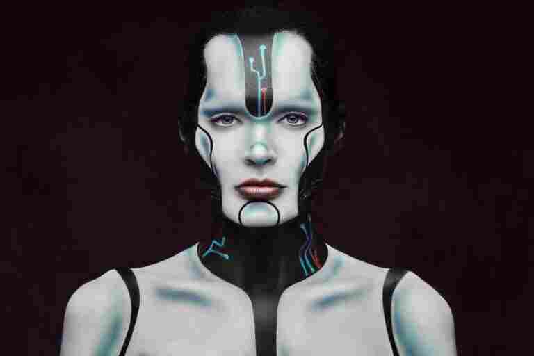 close up portrait cyber woman with creative make up posing dark textured background technology future concept
