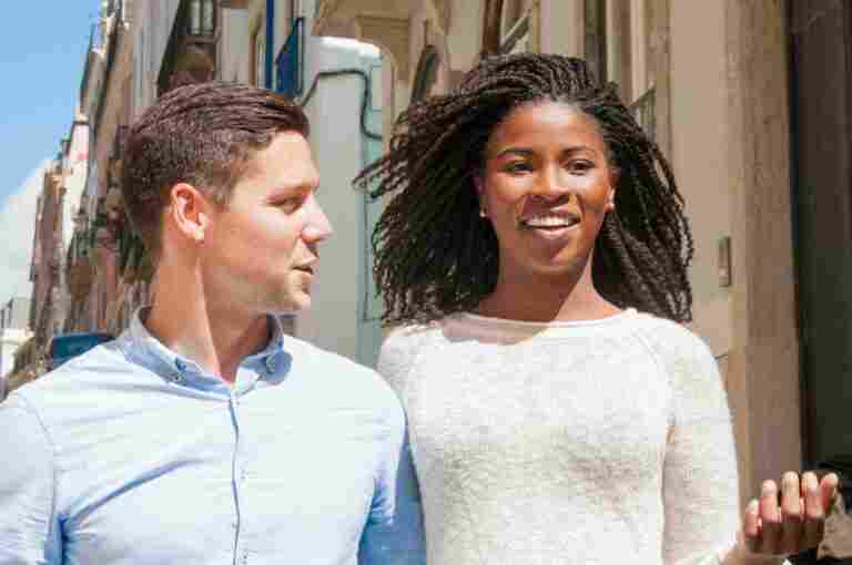 happy multiethnic couple tourists
