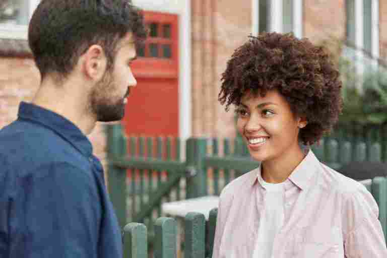 outdoor shot cheerful couple having pleasant conversation