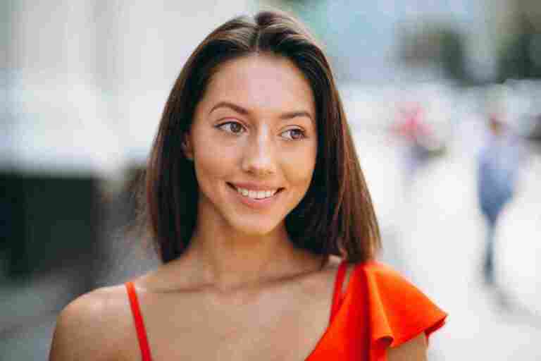 woman red dress model posing outside