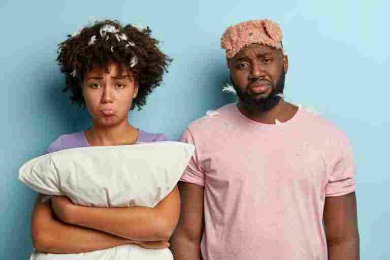 young man woman with sleep mask pillow