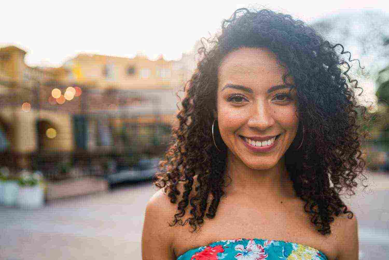 portrait beautiful afro american latin confident woman laughing street outdoors