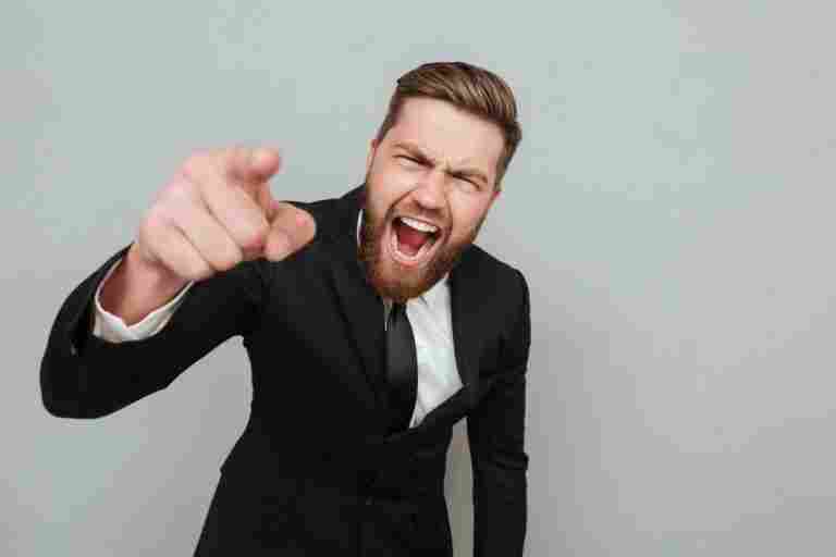 angry businessman suit shouting pointing finger