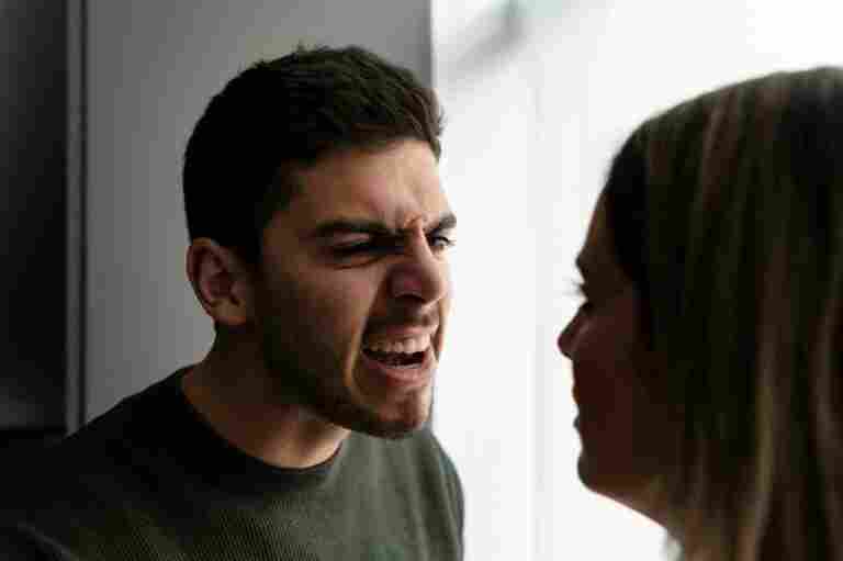 couple fighting with anger home