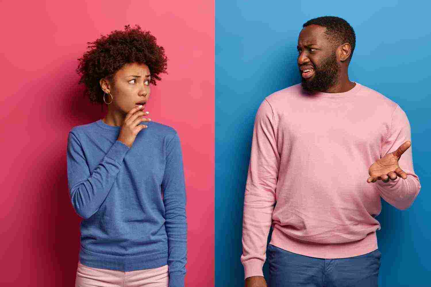 photo puzzled afro american woman man have displeased expressions discuss something unpleasant got bad news