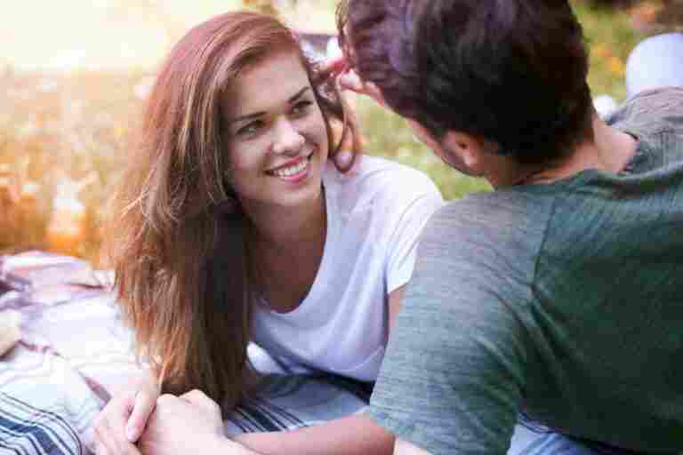 romantic couple enjoying picnic park