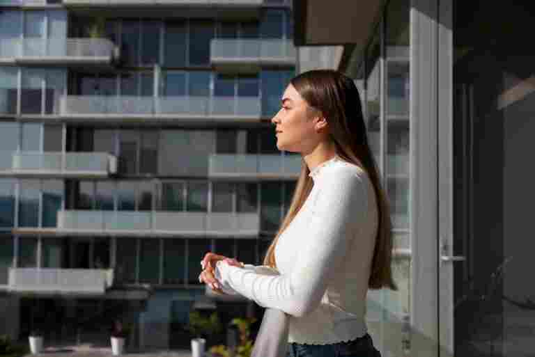 side view woman posing outdoors