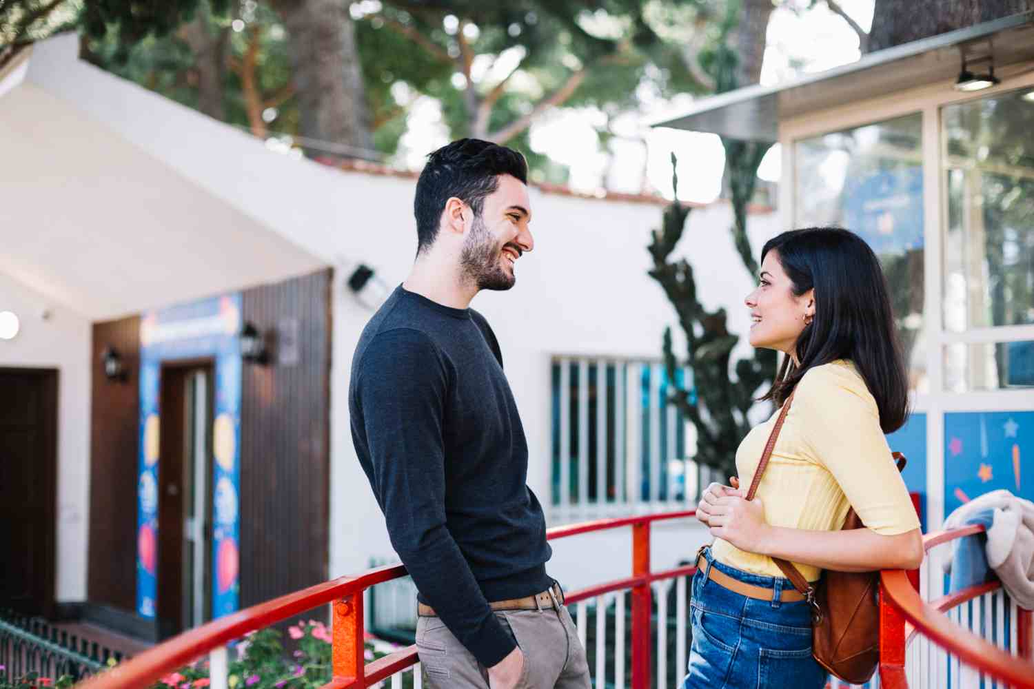 couple talking theme park