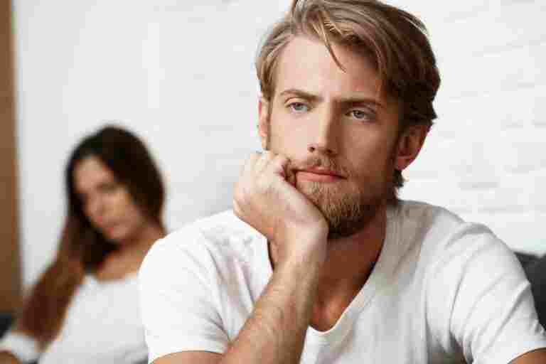 upset handsome man quarrel with his girlfriend