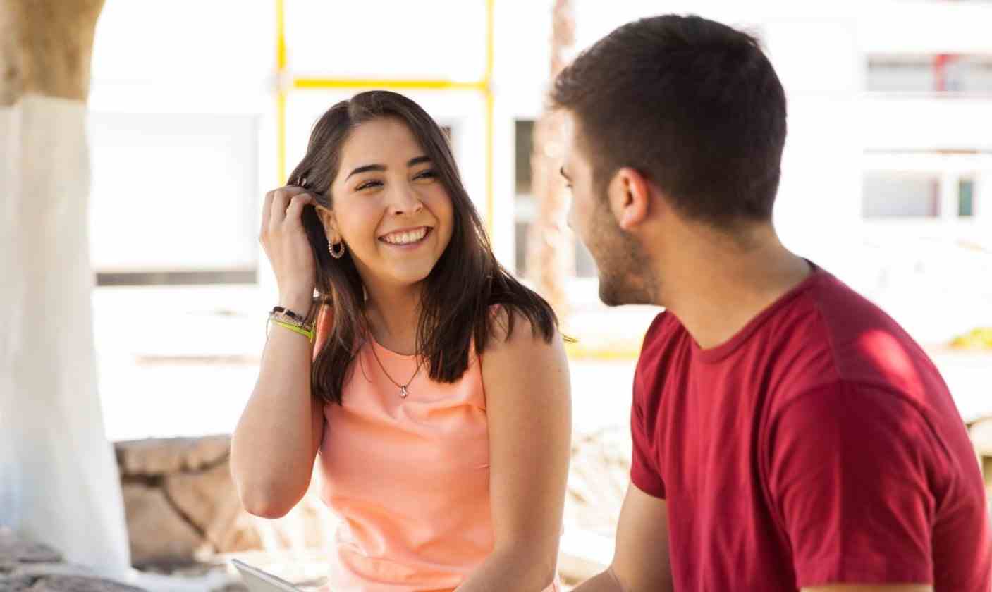 beautiful latin college student flirting talking guy she likes school
