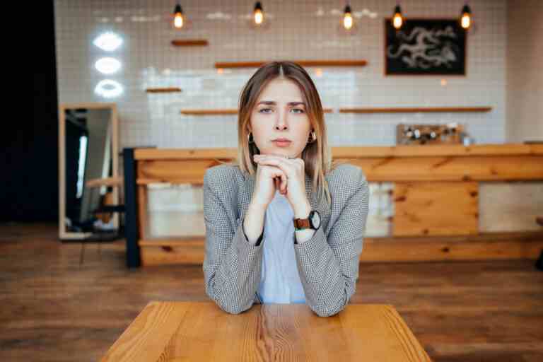 young female candidate interviewed by employer
