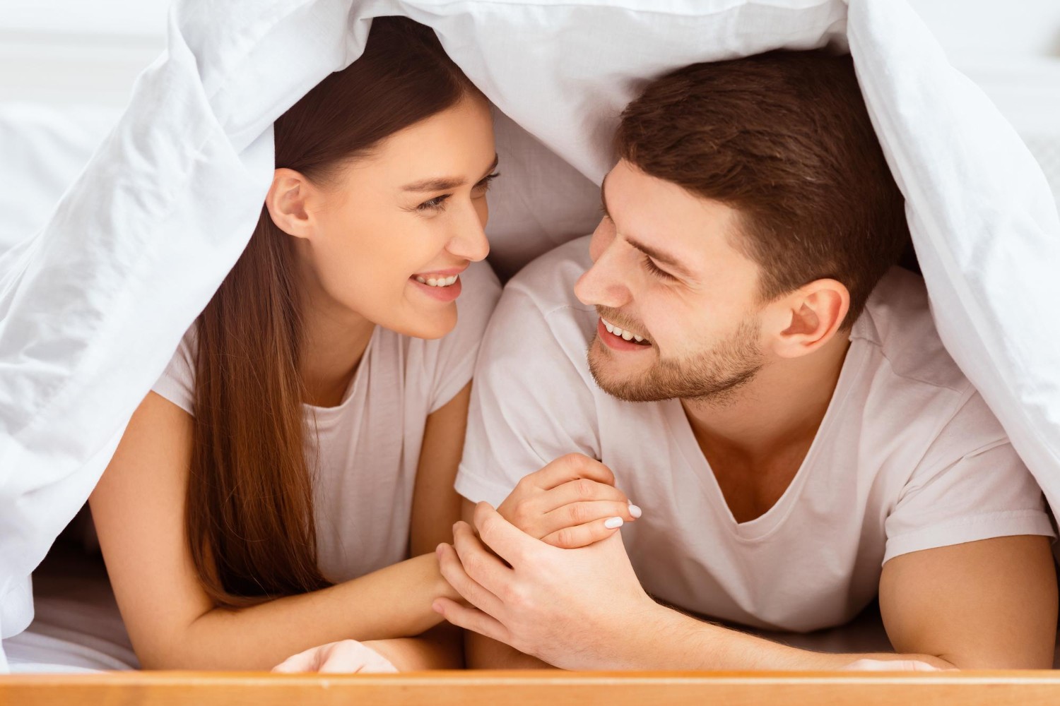 100 Playful Questions to Ask Your Partner in Bed